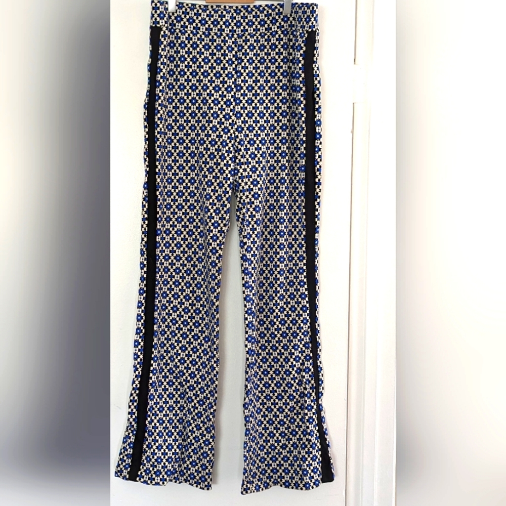 Maeve by Anthropologie. Cobalt blue, white and black patterned flared pants.